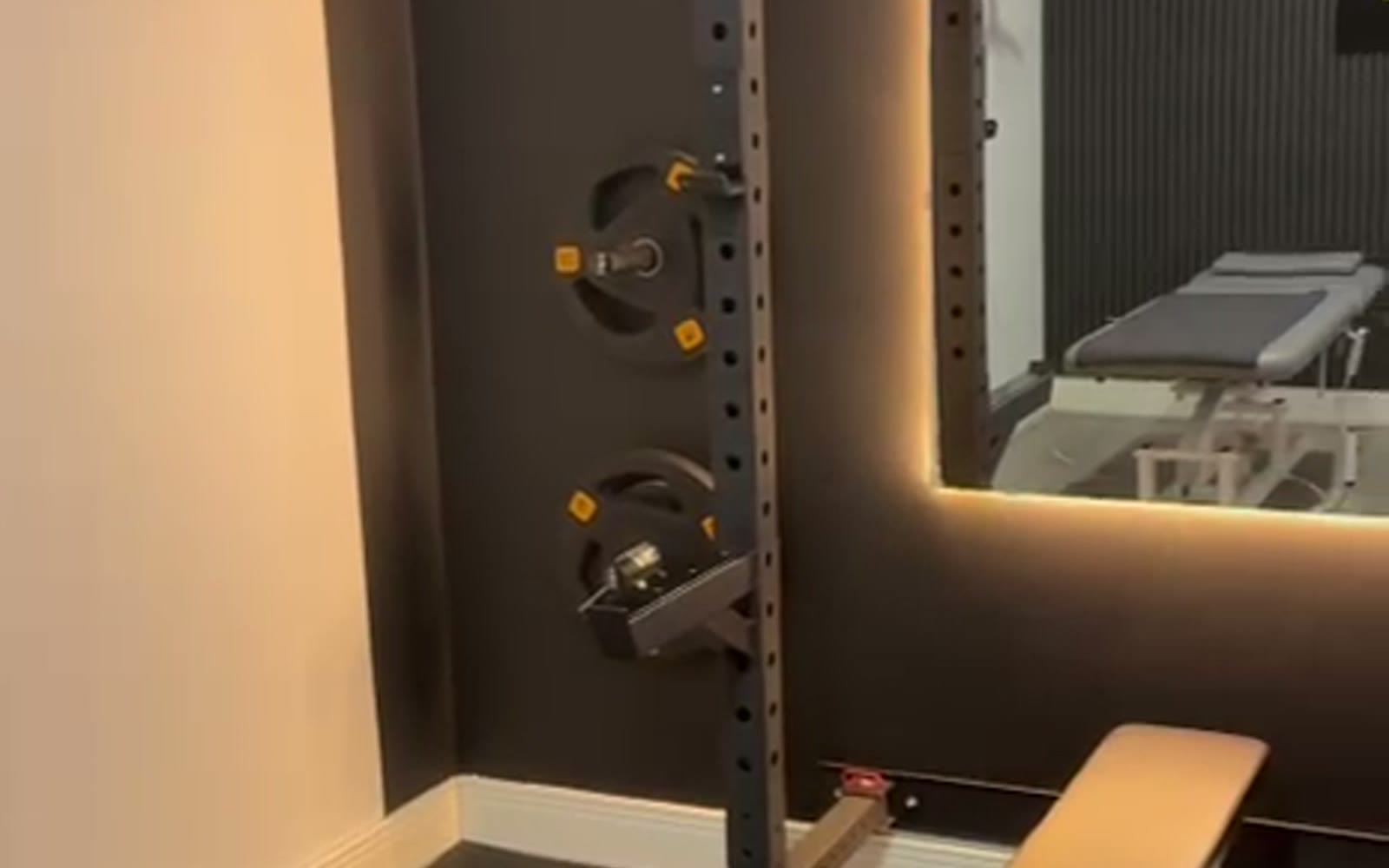 Training rack with backlit mirror in the clinic